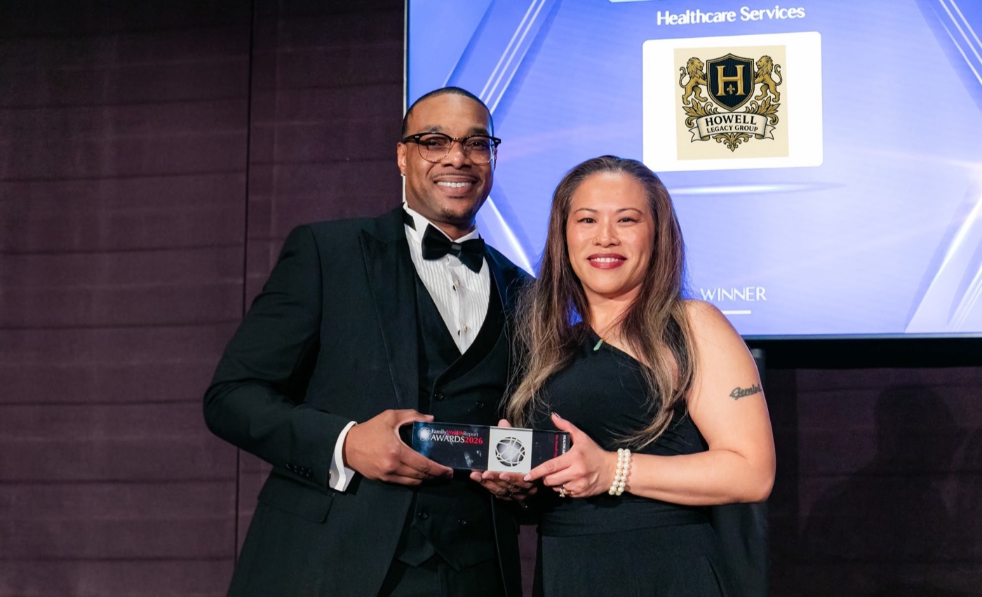 John Shelton Howell III accepting the Family Wealth Report Award on stage at the Mandarin Oriental, Manhattan